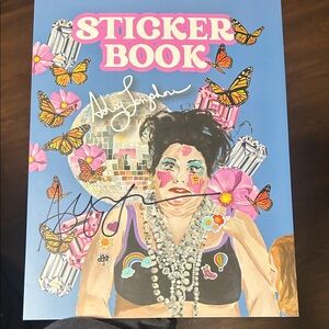 Ashley Longshore Signed Sticker Book

Accidently bought 2 not realizing, signed!